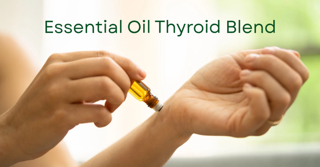 Close-up of hands applying an essential oil thyroid blend to the wrist